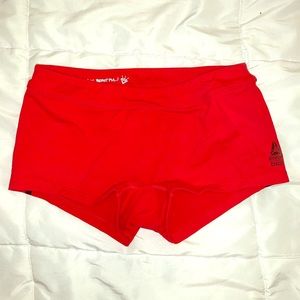 Red Reebok athletic shorts (s)